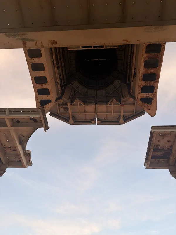 Looking straight up inside the tower's open concrete shaft.